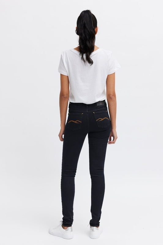 Figure hugging black jeans