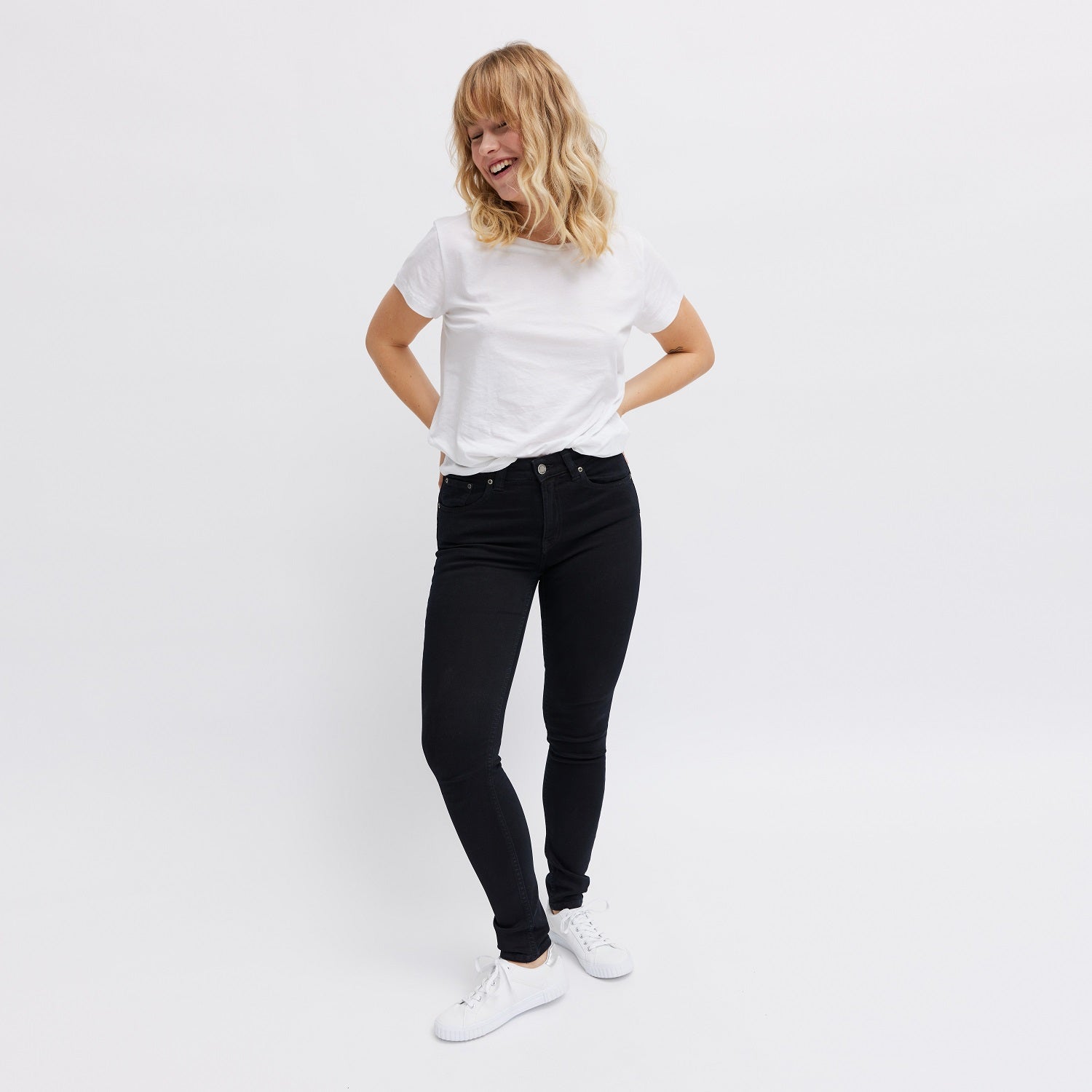 tight fit dark jeans