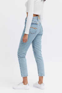 Light blue female cropped jeans. Organic denim, relaxed fit
