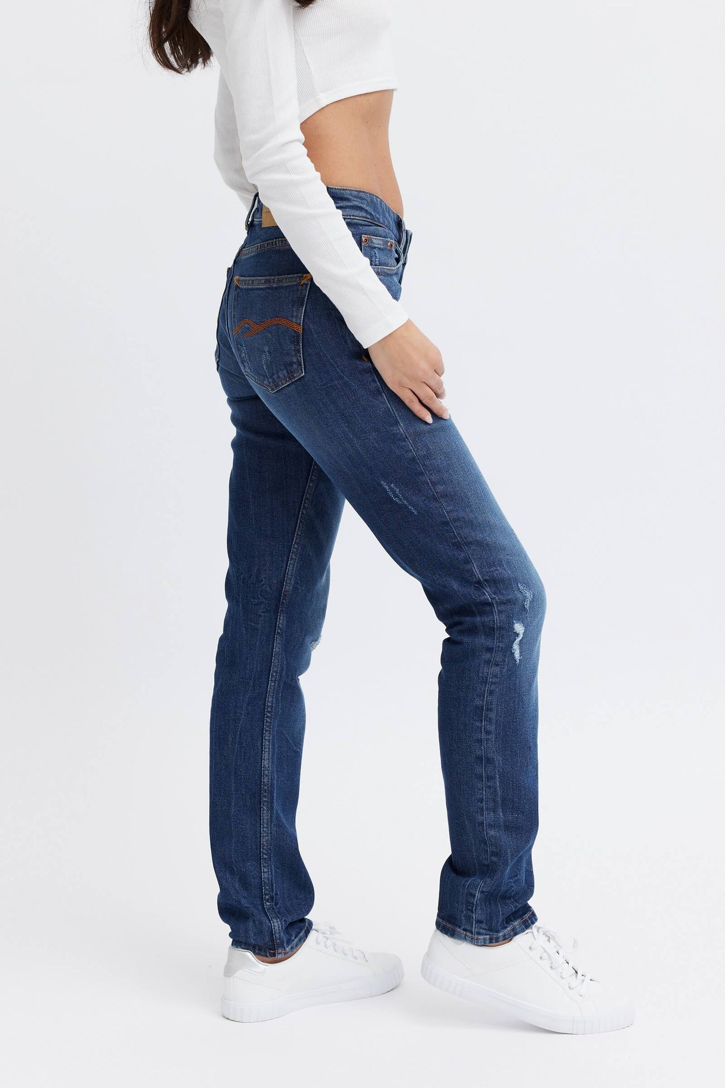 Dark blue ripped denim jeans for women