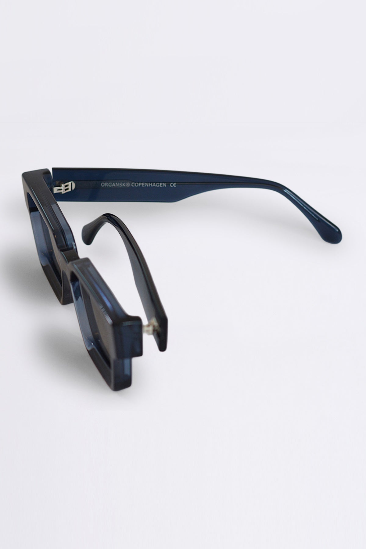 Blue eyeglasses on a white background
