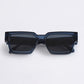 Dark blue sunglasses on a light gray background