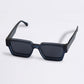 Blue sunglasses with a geometric frame on a light gray background