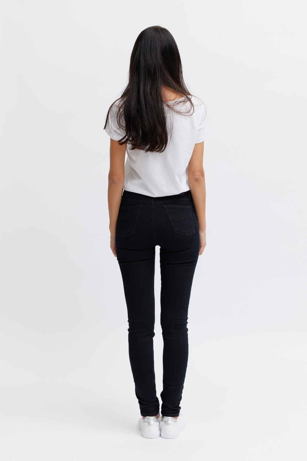 Black jeans with black pocket embroidery
