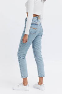 Light blue female cropped  jeans. Organic denim, relaxed fit