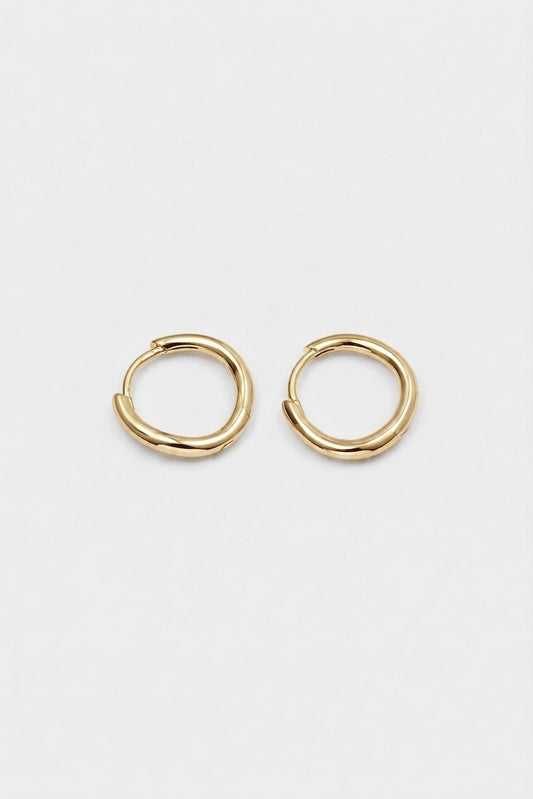 A pair of gold-toned, twisted hoop earrings shown on a plain light gray background.