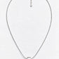 A silver chain necklace with a small textured geometric pendant, displayed on a clean white background.