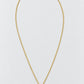 A delicate gold chain necklace with a textured gold pendant cradling a single white pearl, displayed on a clean light gray background.