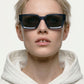 woman blue sunglasses plant based