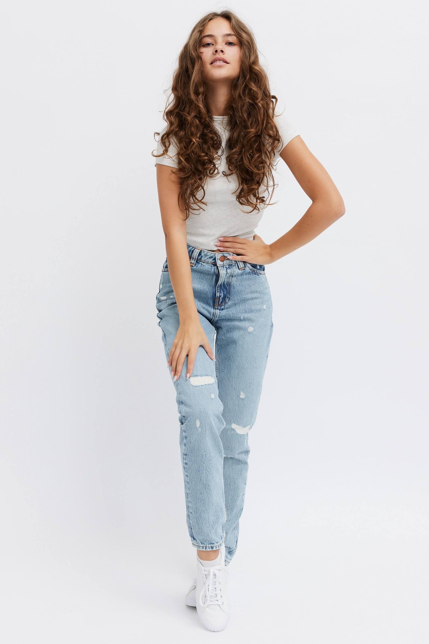 Ripped jeans and stylish denim for women. 