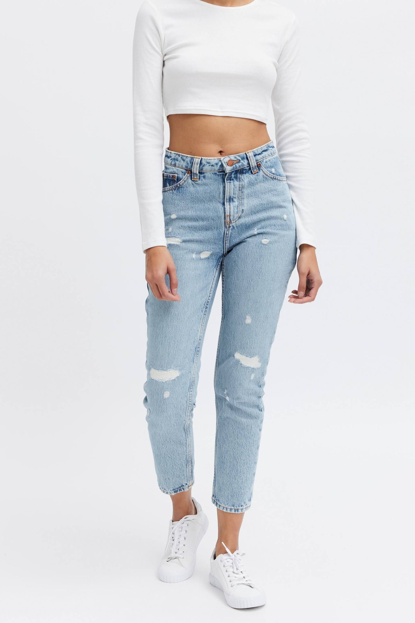high rise ethical pants. Ripped denim 