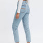 Light blue female cropped  jeans. Organic denim, relaxed fit